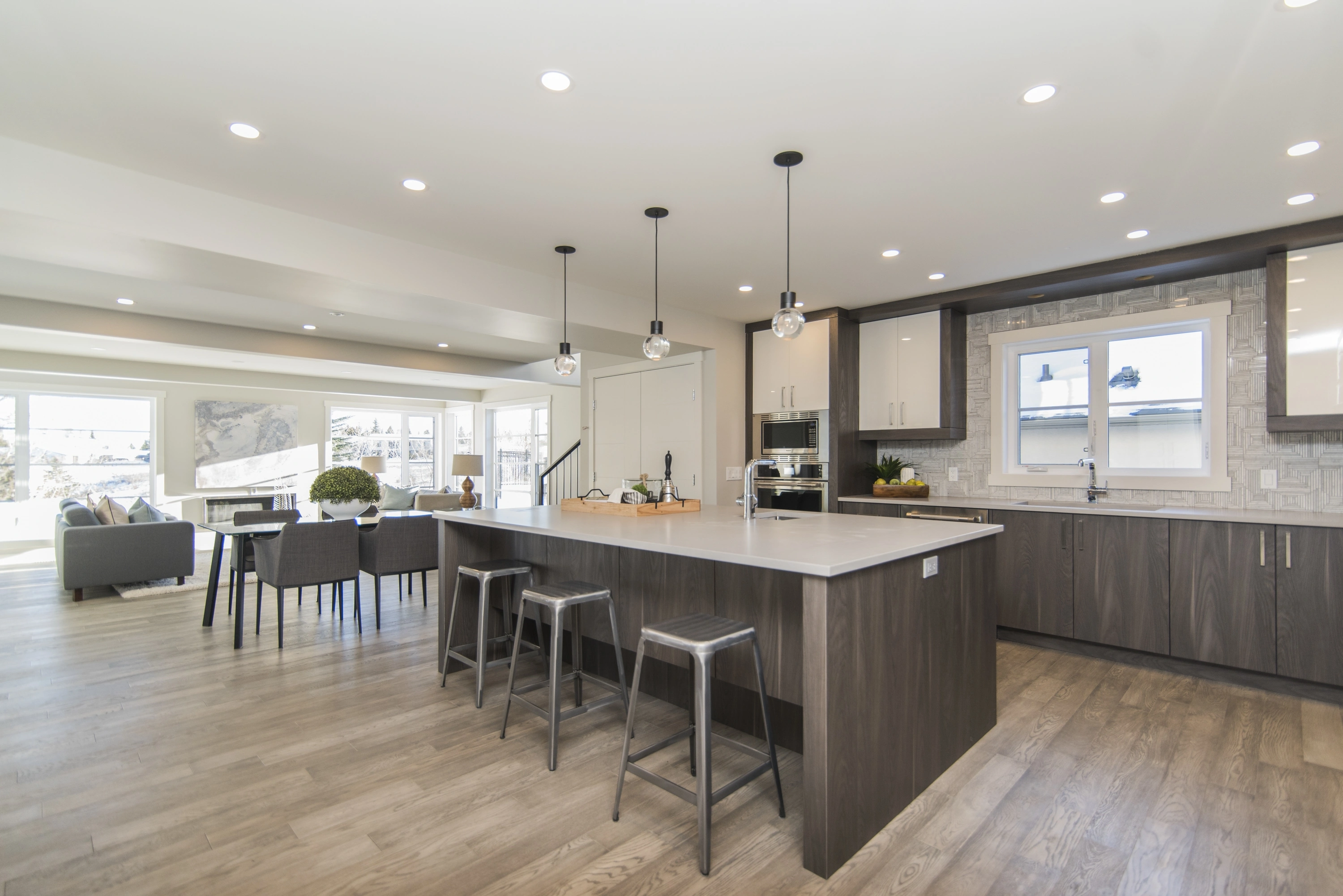 Custom-built cabinets in a modern kitchen and dining room
